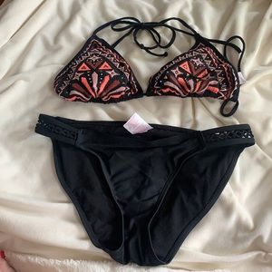 Swimsuit, large top, medium bottoms.